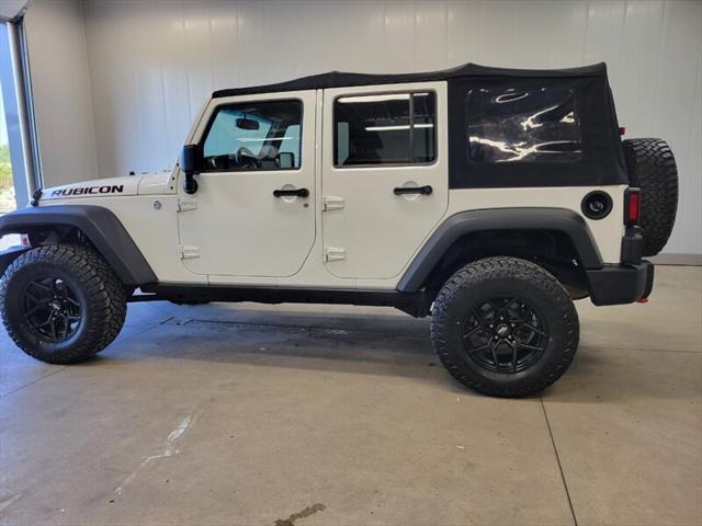 used 2014 Jeep Wrangler Unlimited car, priced at $20,985