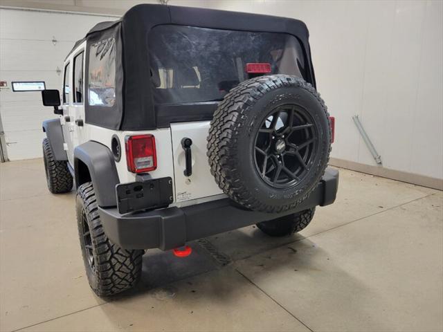 used 2014 Jeep Wrangler Unlimited car, priced at $20,985