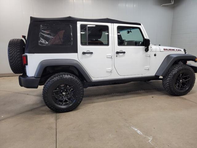 used 2014 Jeep Wrangler Unlimited car, priced at $20,985