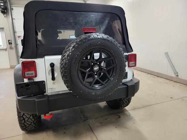 used 2014 Jeep Wrangler Unlimited car, priced at $20,985