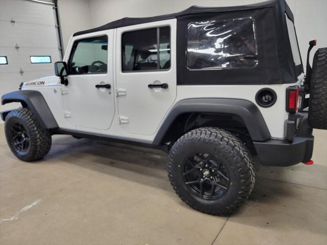 used 2014 Jeep Wrangler Unlimited car, priced at $20,985