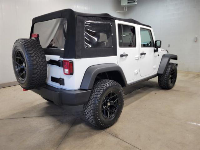 used 2014 Jeep Wrangler Unlimited car, priced at $20,985