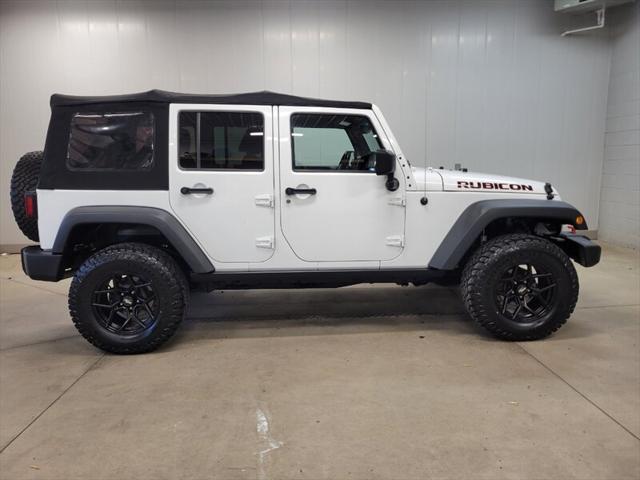 used 2014 Jeep Wrangler Unlimited car, priced at $20,985