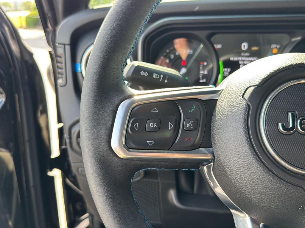 used 2024 Jeep Wrangler 4xe car, priced at $47,338