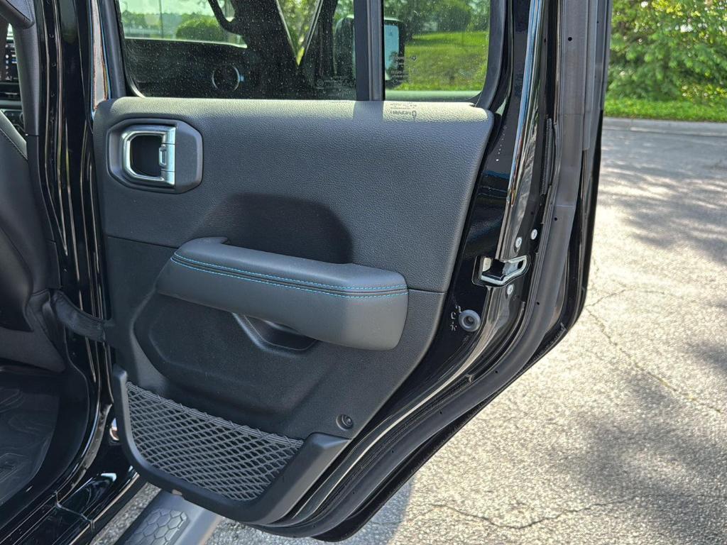used 2024 Jeep Wrangler 4xe car, priced at $47,338