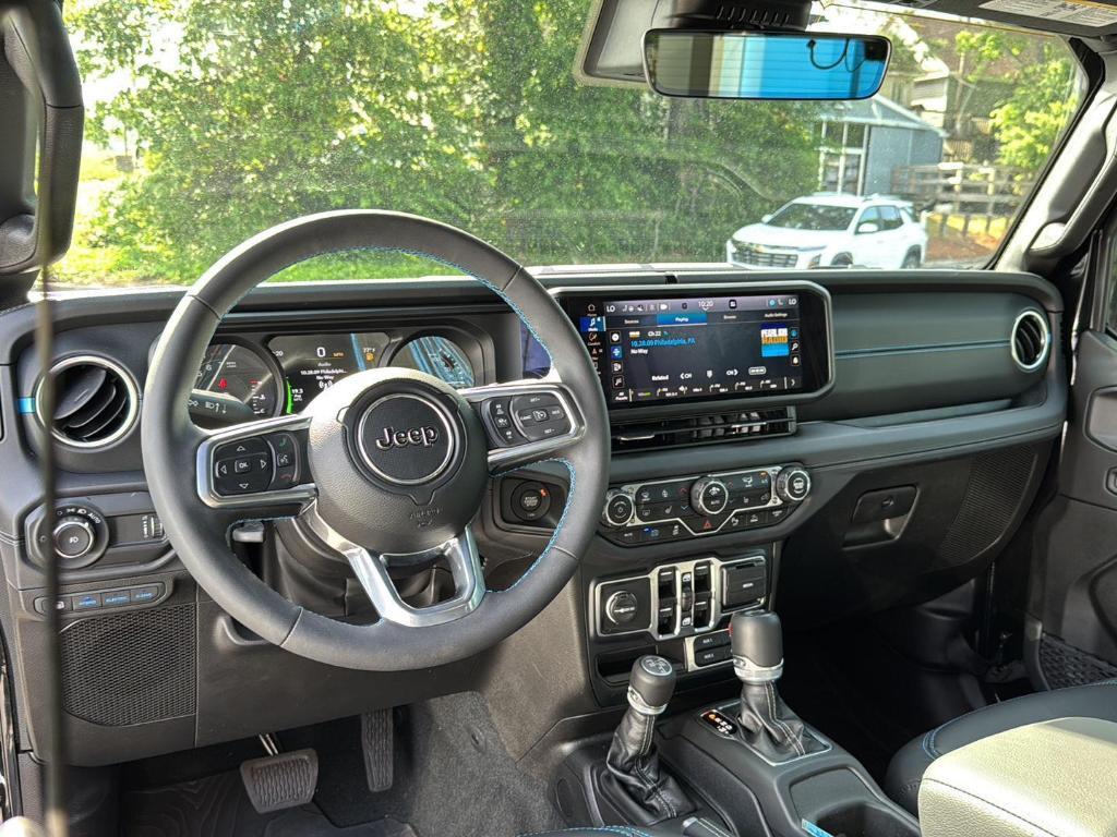 used 2024 Jeep Wrangler 4xe car, priced at $47,338