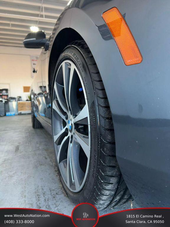 used 2014 BMW 228 car, priced at $11,999