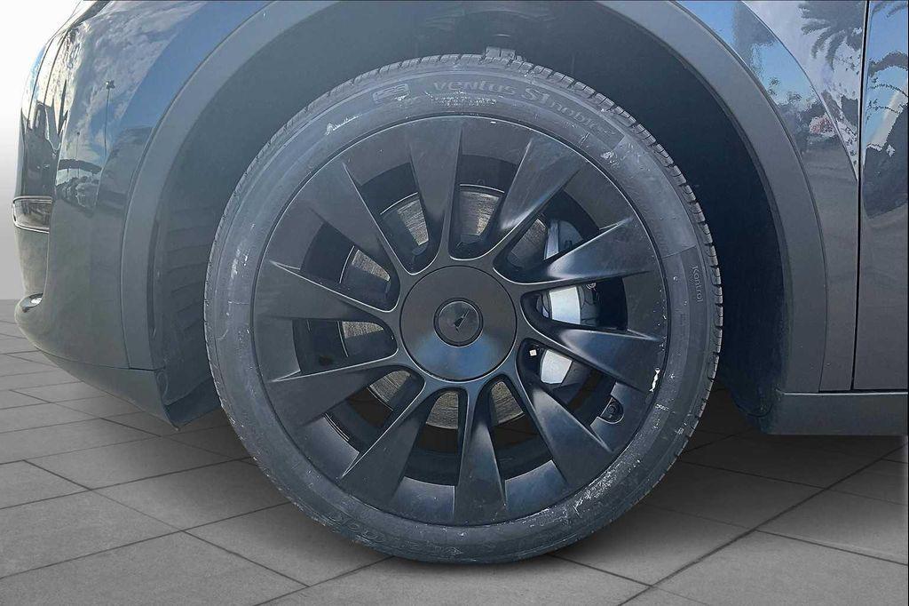used 2025 Tesla Model Y car, priced at $37,995