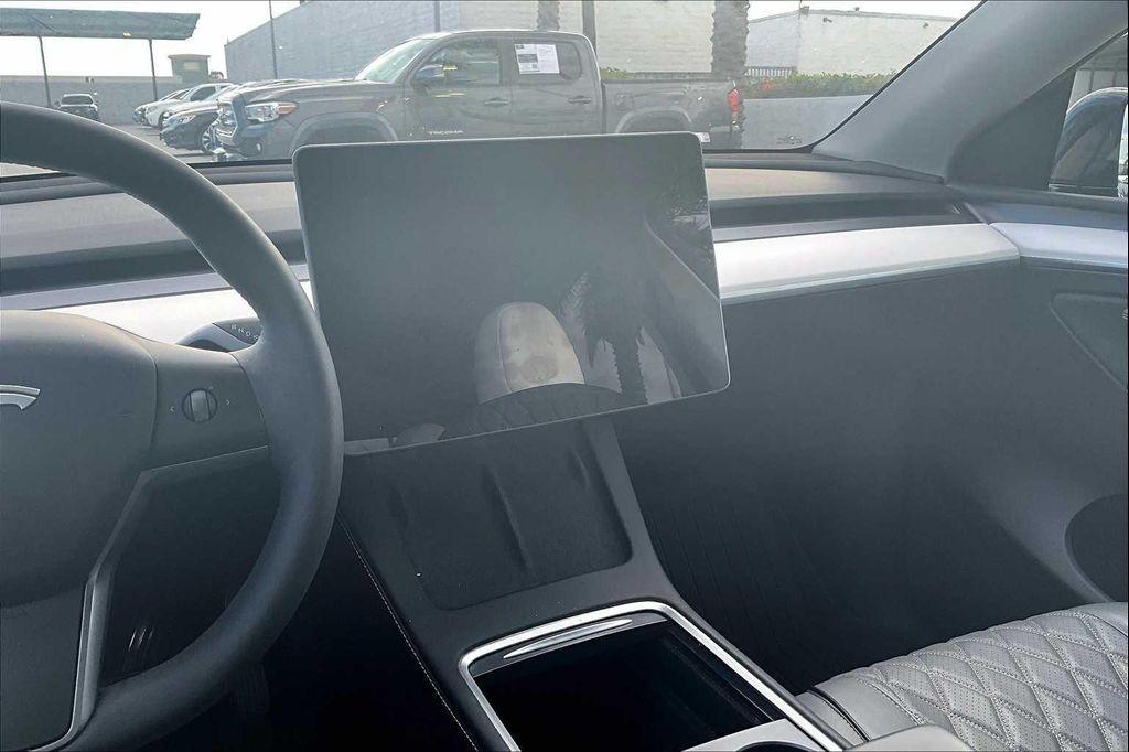 used 2025 Tesla Model Y car, priced at $37,995