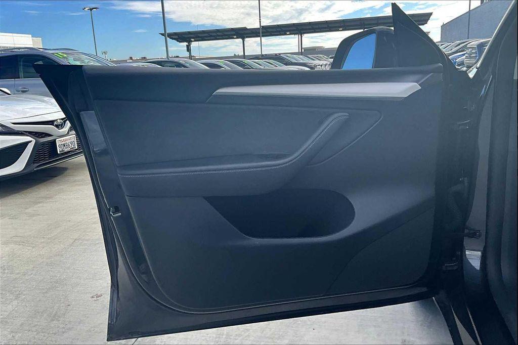used 2025 Tesla Model Y car, priced at $37,995