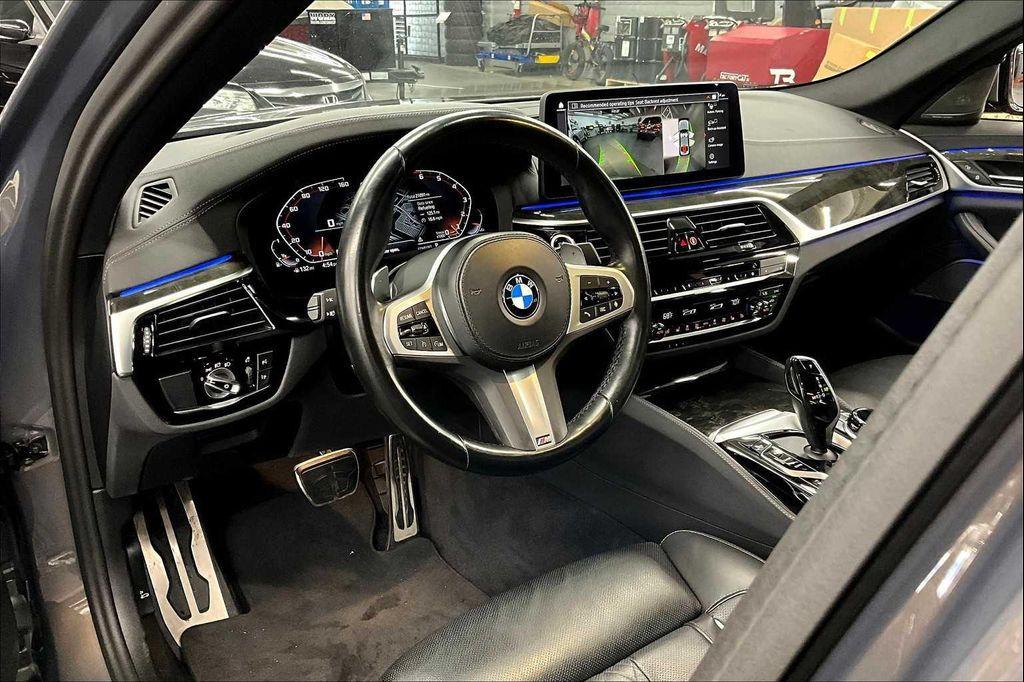 used 2023 BMW M550 car, priced at $60,795