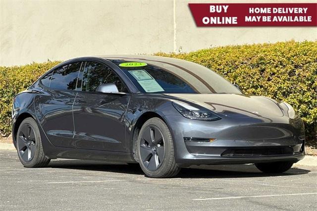 used 2023 Tesla Model 3 car, priced at $27,000