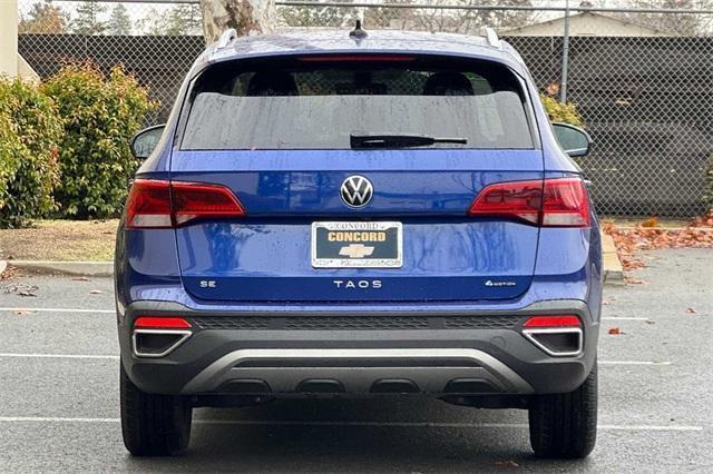 used 2023 Volkswagen Taos car, priced at $23,300