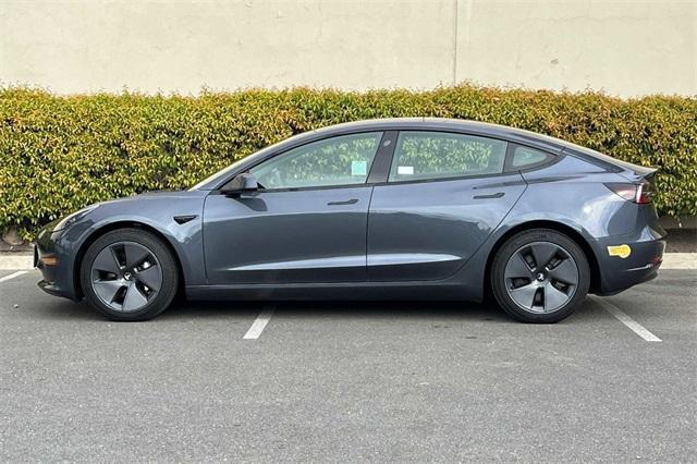 used 2022 Tesla Model 3 car, priced at $30,900