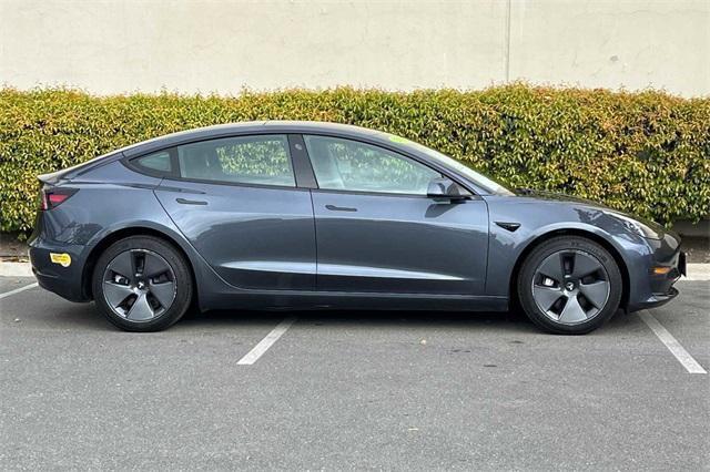 used 2022 Tesla Model 3 car, priced at $30,900