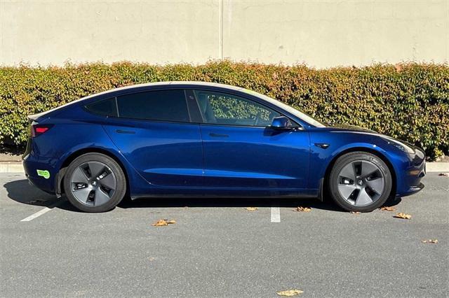 used 2023 Tesla Model 3 car, priced at $28,000