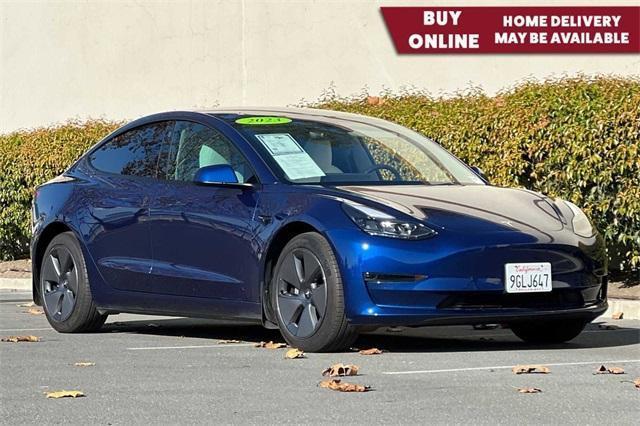 used 2023 Tesla Model 3 car, priced at $28,000