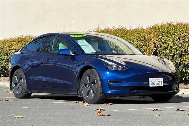 used 2023 Tesla Model 3 car, priced at $28,000