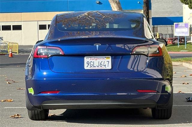 used 2023 Tesla Model 3 car, priced at $28,000