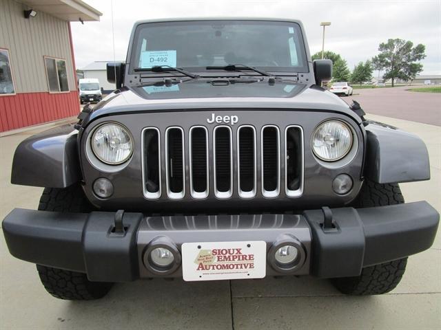 used 2016 Jeep Wrangler Unlimited car, priced at $18,690