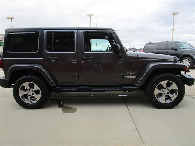 used 2016 Jeep Wrangler Unlimited car, priced at $18,690