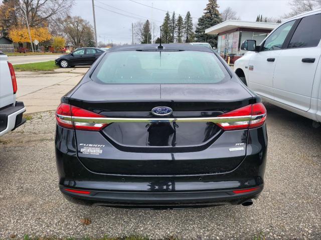 used 2018 Ford Fusion car, priced at $12,975