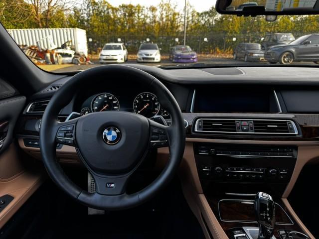 used 2015 BMW 750 car, priced at $18,990