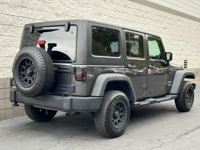 used 2014 Jeep Wrangler Unlimited car, priced at $18,990