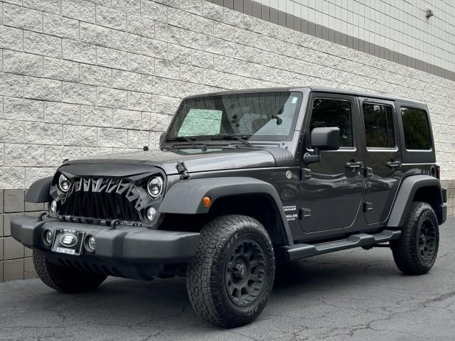 used 2014 Jeep Wrangler Unlimited car, priced at $18,990