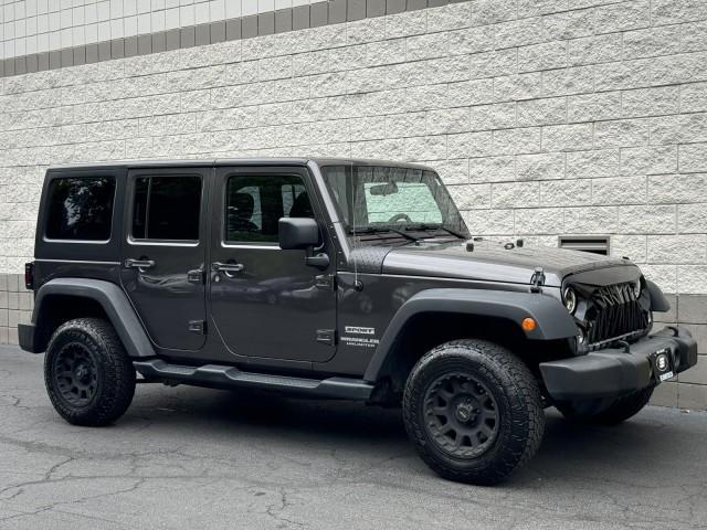 used 2014 Jeep Wrangler Unlimited car, priced at $18,990