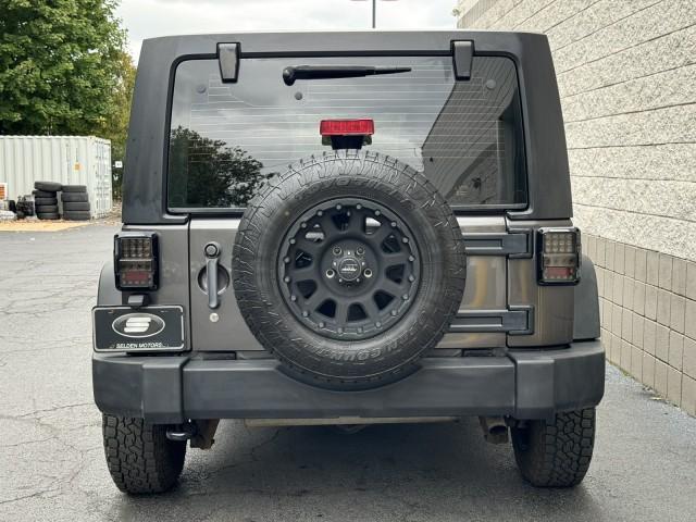 used 2014 Jeep Wrangler Unlimited car, priced at $18,990