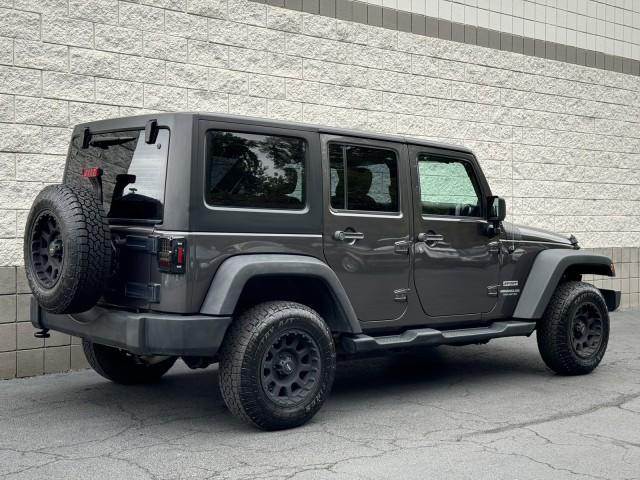 used 2014 Jeep Wrangler Unlimited car, priced at $18,990