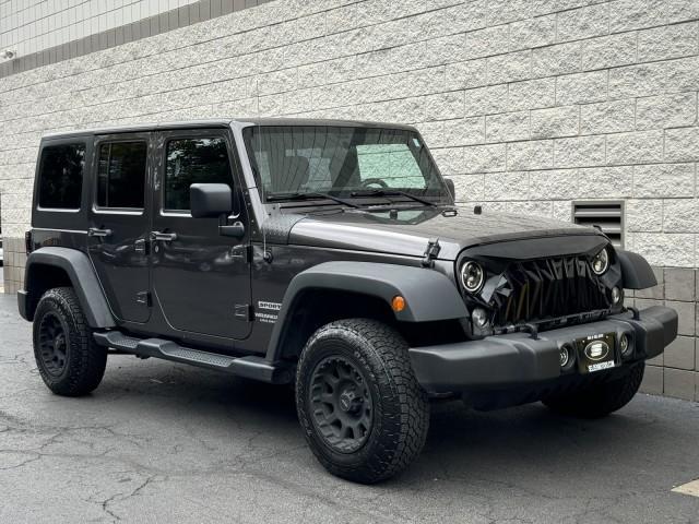 used 2014 Jeep Wrangler Unlimited car, priced at $18,990