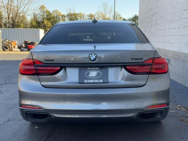 used 2016 BMW 750 car, priced at $23,900