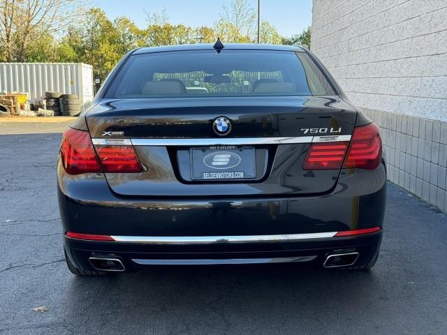 used 2015 BMW 750 car, priced at $16,500