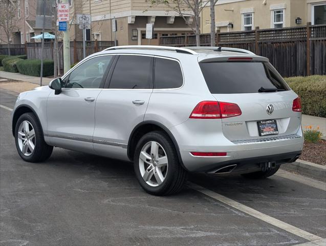 used 2014 Volkswagen Touareg car, priced at $16,988
