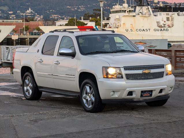 used 2013 Chevrolet Avalanche car, priced at $18,988