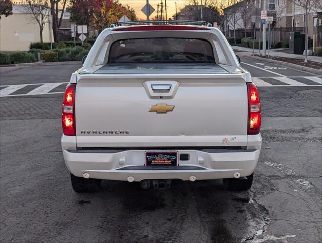 used 2013 Chevrolet Avalanche car, priced at $18,988