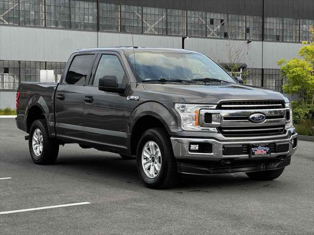 used 2018 Ford F-150 car, priced at $21,988