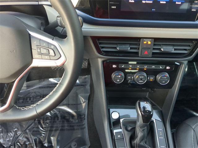 used 2024 Volkswagen Taos car, priced at $22,991