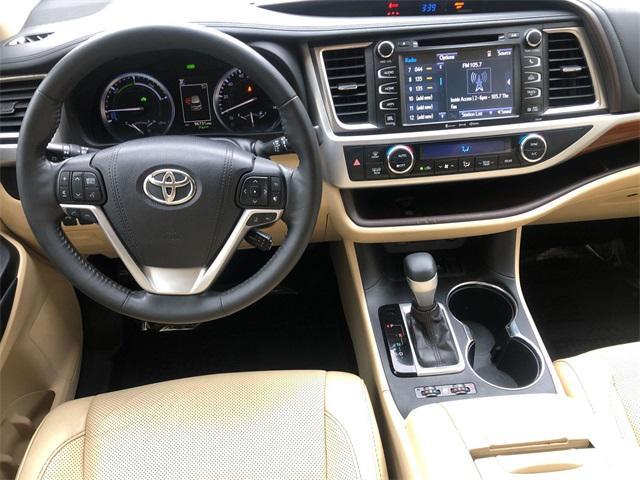 used 2018 Toyota Highlander Hybrid car, priced at $25,673