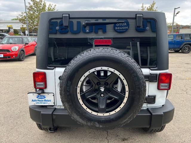 used 2016 Jeep Wrangler Unlimited car, priced at $16,990