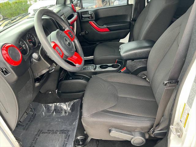 used 2016 Jeep Wrangler Unlimited car, priced at $16,990