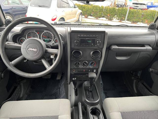 used 2010 Jeep Wrangler Unlimited car, priced at $14,490