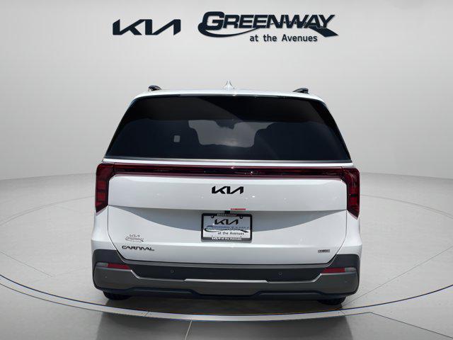 new 2025 Kia Carnival Hybrid car, priced at $50,076