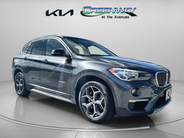 used 2018 BMW X1 car, priced at $14,999