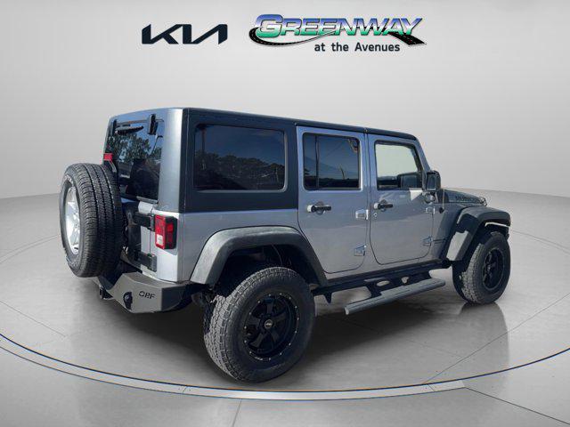 used 2013 Jeep Wrangler Unlimited car, priced at $17,686