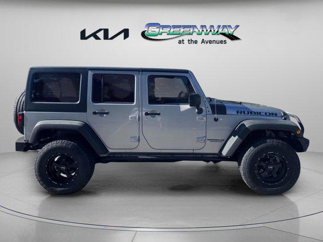 used 2013 Jeep Wrangler Unlimited car, priced at $17,686