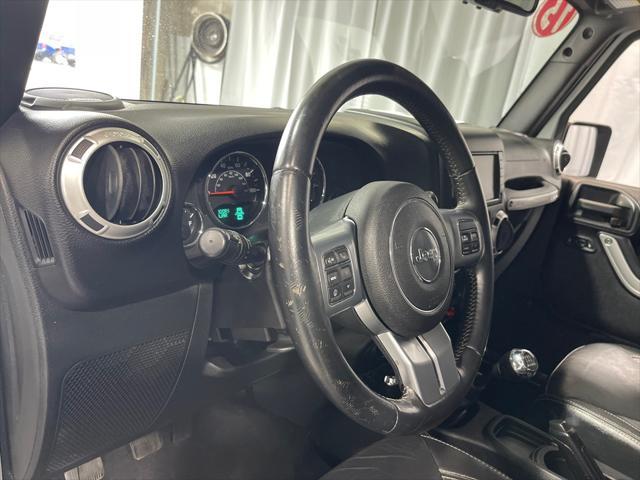 used 2015 Jeep Wrangler Unlimited car, priced at $16,999