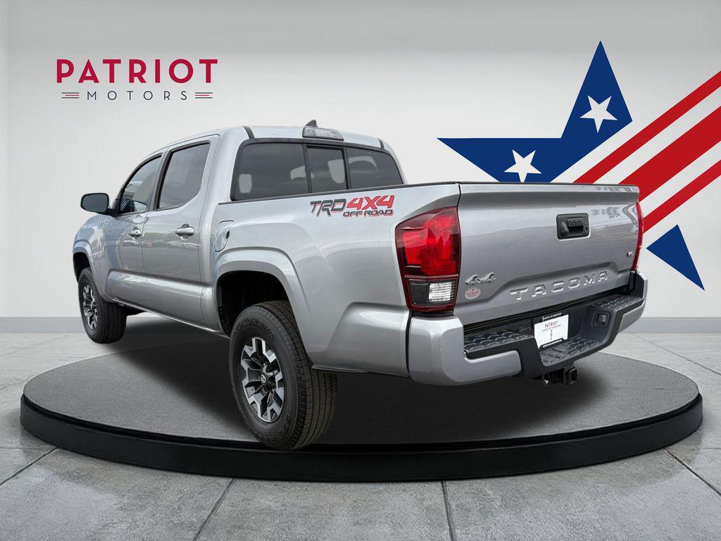 used 2018 Toyota Tacoma car, priced at $27,696